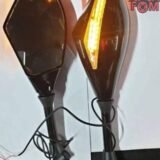 Universal looking glass with indicator for motorcycles